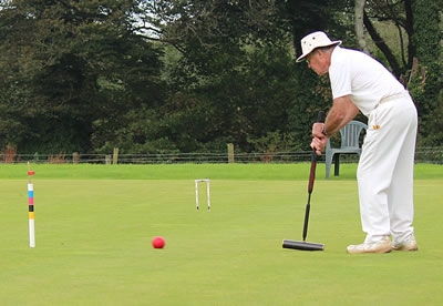 Tony Backhouse pegs out red to win 
The President's Cup for Association Croquet